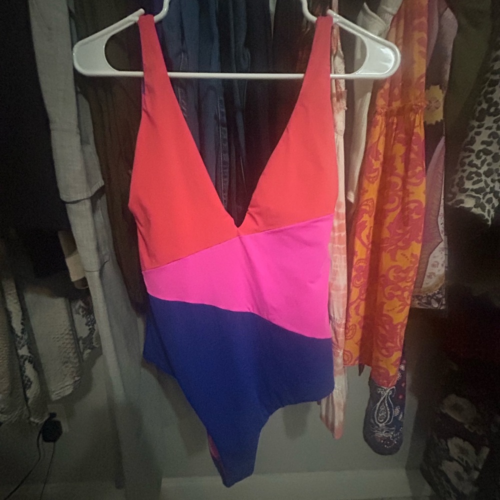 Maaji blue/coral/Pink Reversible 1- Piece swim w/Plunging V-neckline. Worn twice